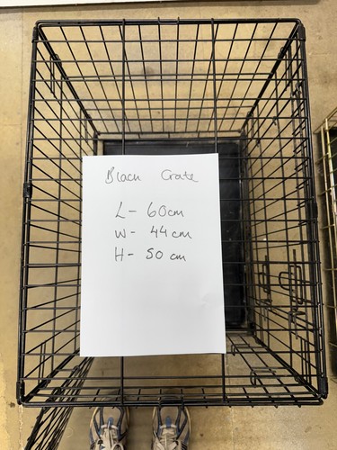 Small black dog - dog, crate